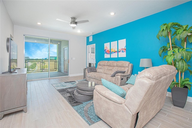 living room featuring ceiling fan