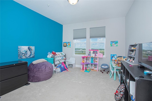 recreation room with carpet floors