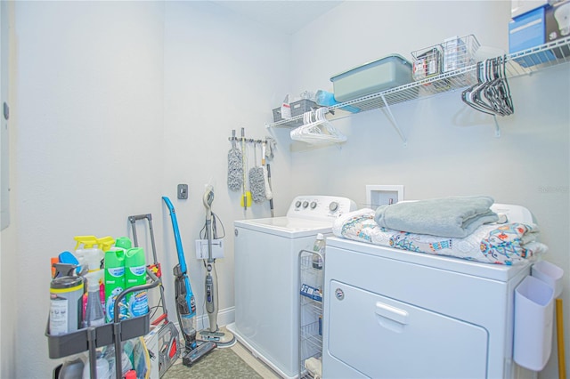 laundry room with washer hookup and washer and clothes dryer