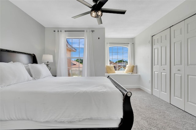 bedroom with carpet, a closet, and ceiling fan