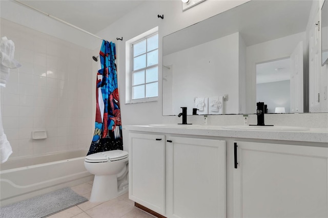 full bathroom featuring tile flooring, shower / bath combination with curtain, vanity, and toilet