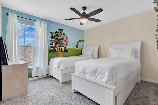 bedroom with ceiling fan and carpet flooring