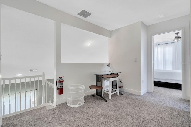 playroom with carpet and ceiling fan