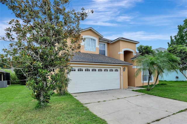 view of front facade featuring a front lawn and a garage