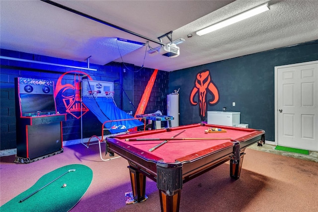 rec room with billiards, a textured ceiling, water heater, and carpet floors