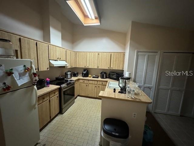 kitchen featuring stainless steel range with electric stovetop, tile floors, light brown cabinetry, white fridge, and butcher block countertops