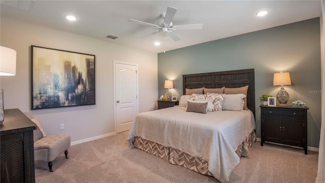 bedroom with light colored carpet and ceiling fan