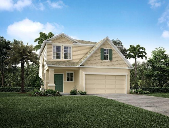 view of front facade with a garage and a front yard