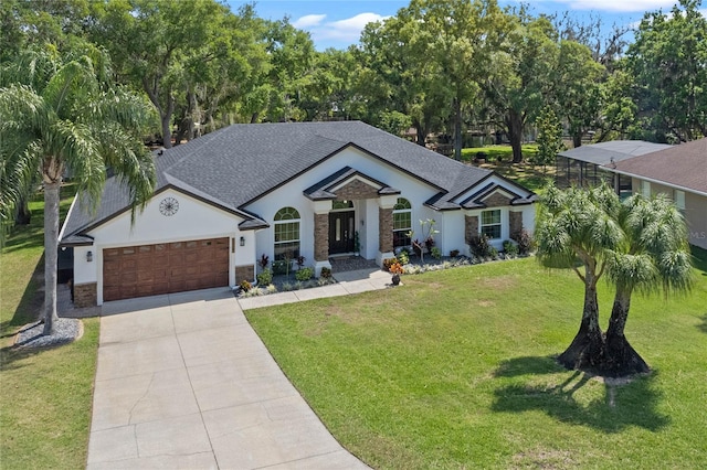 view of front of house featuring a front yard and a garage