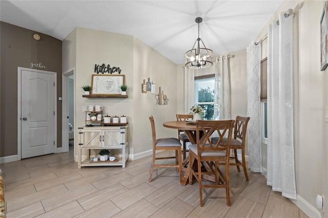 tiled dining room with a notable chandelier