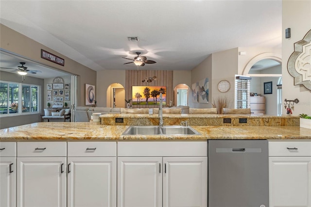 kitchen featuring white cabinets, sink, dishwasher, and ceiling fan