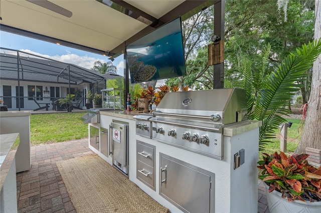 view of patio with area for grilling and grilling area