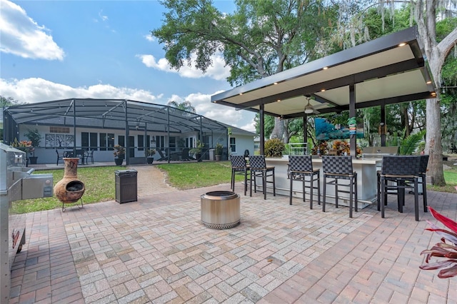 view of terrace with a bar