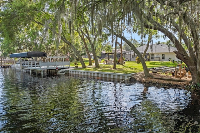 view of dock with a water view