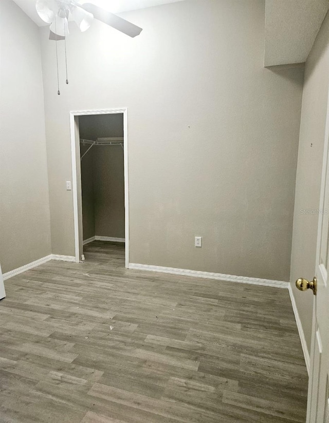 spare room featuring wood-type flooring