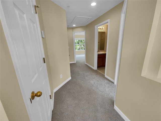 corridor with carpet floors