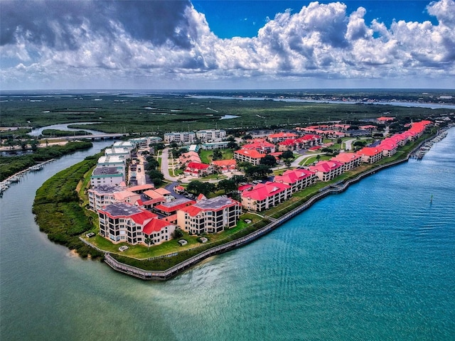 birds eye view of property featuring a water view