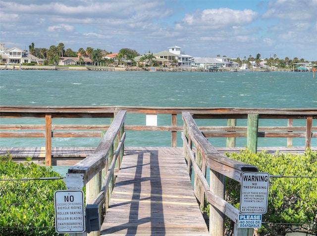 dock area featuring a water view