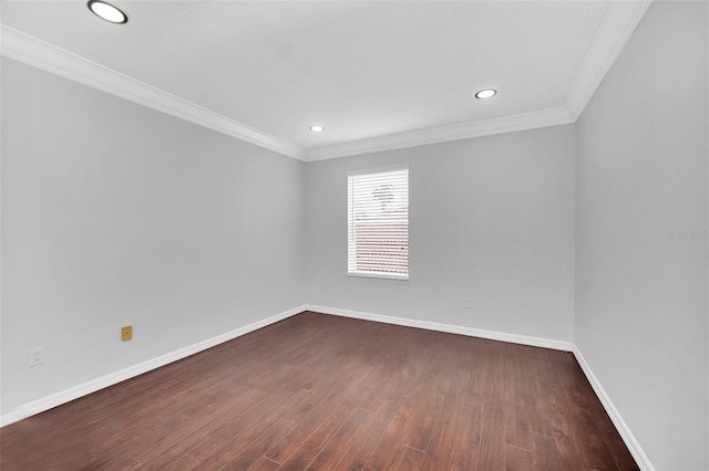 unfurnished room with dark hardwood / wood-style flooring and crown molding