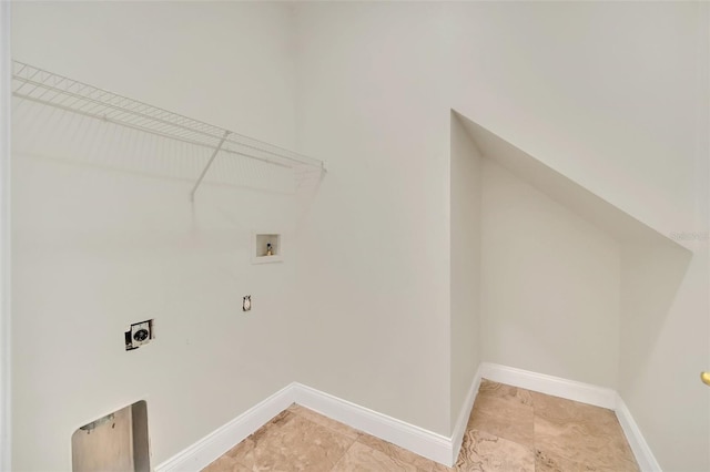 clothes washing area with tile flooring, electric dryer hookup, and washer hookup