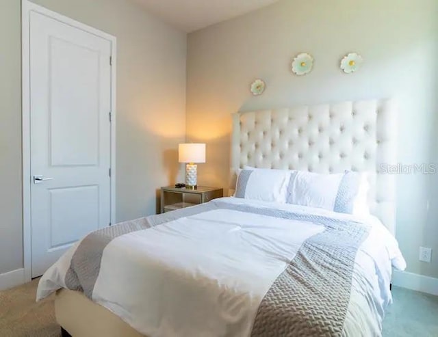 bedroom featuring carpet flooring