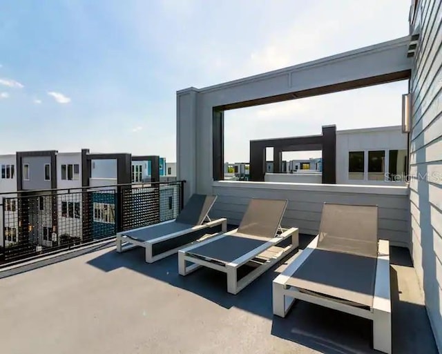 view of patio / terrace featuring a balcony