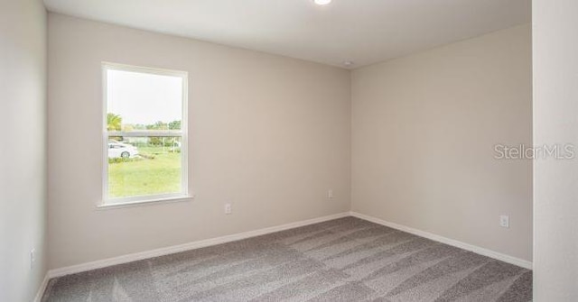 view of carpeted spare room