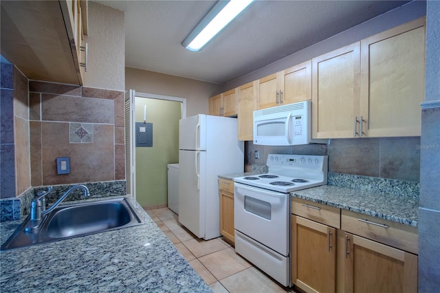 kitchen featuring sink, light brown cabinets, light tile patterned floors, electric panel, and white appliances