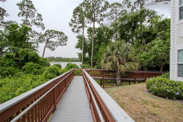 surrounding community featuring a water view