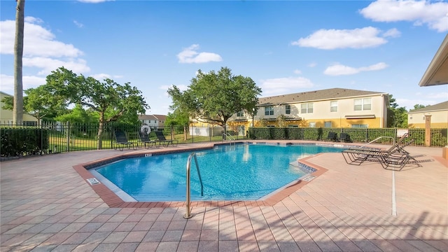 view of pool featuring a patio area