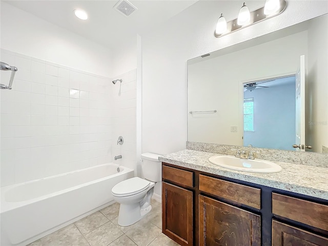 full bathroom with toilet, vanity, tile patterned floors, ceiling fan, and washtub / shower combination