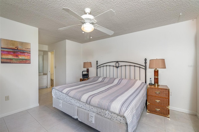 tiled bedroom featuring ceiling fan and a textured ceiling