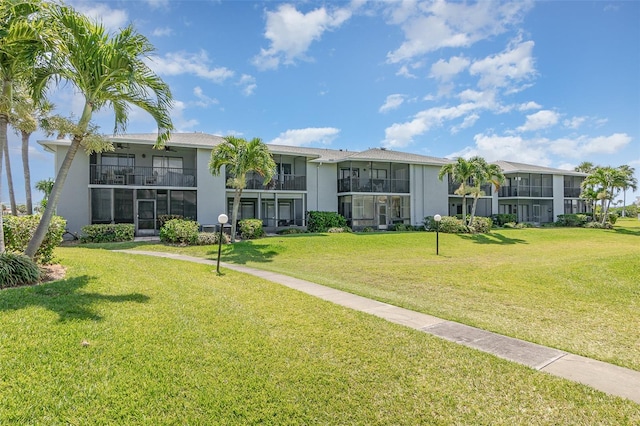 view of front of property with a front lawn