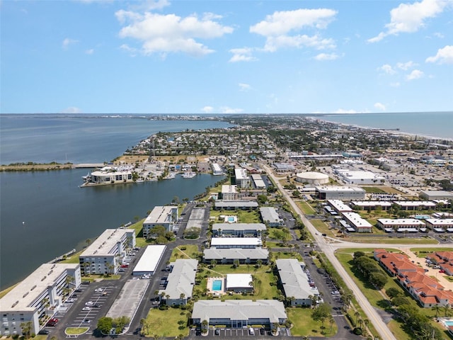 bird's eye view with a water view