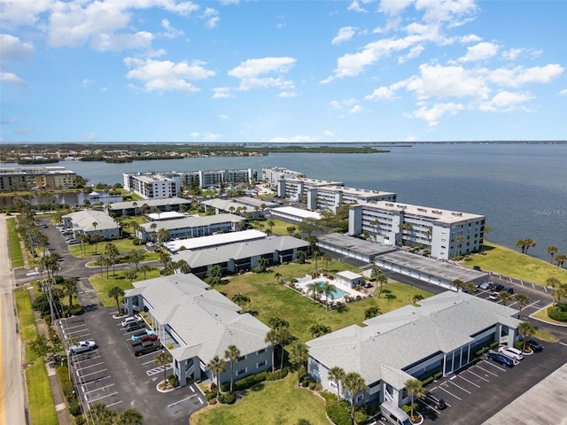 bird's eye view with a water view