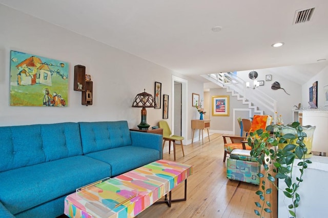 living room with light hardwood / wood-style floors