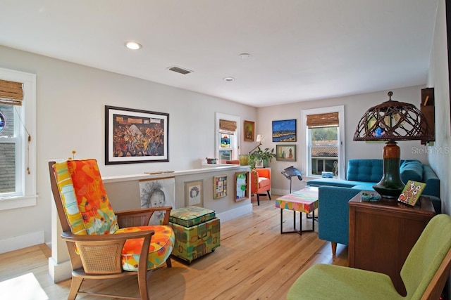 sitting room featuring light wood-type flooring