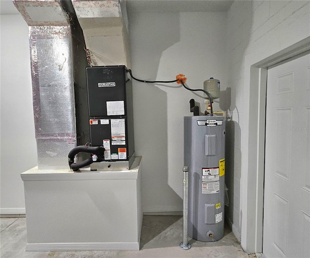 utility room featuring electric water heater