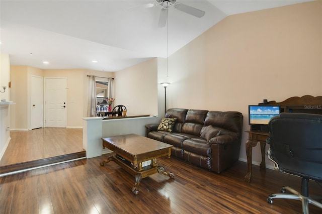 living room featuring lofted ceiling, ceiling fan, and dark hardwood / wood-style floors