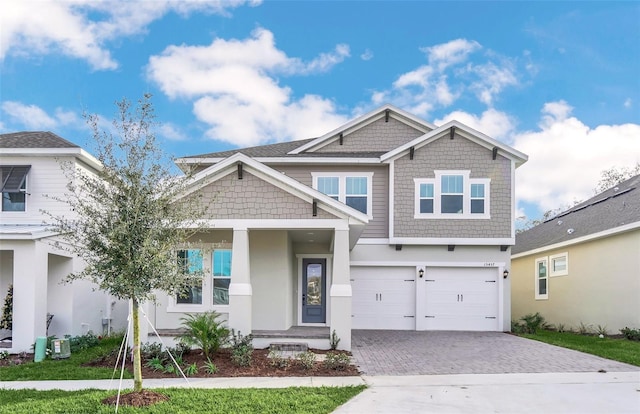 craftsman-style house featuring a garage