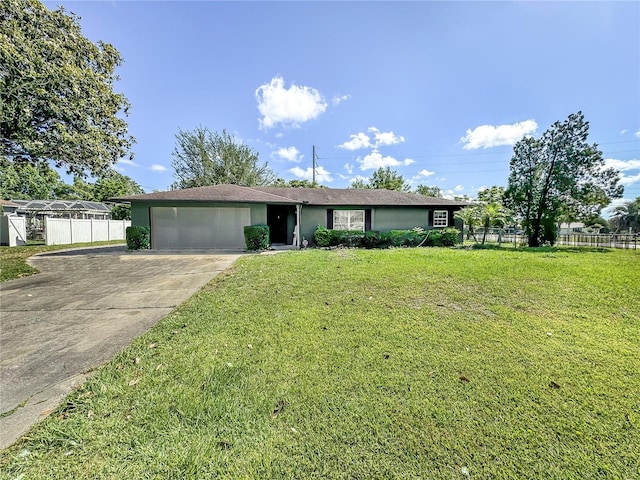 ranch-style house with driveway, an attached garage, fence, a front lawn, and stucco siding