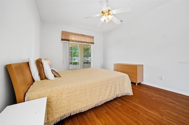 bedroom with hardwood / wood-style floors and ceiling fan