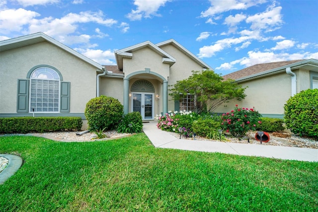 view of front of home with a front yard