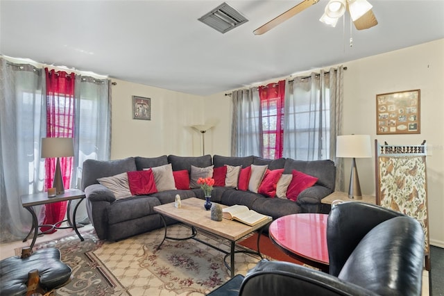 living room featuring ceiling fan