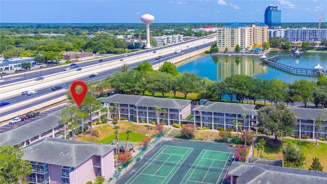 birds eye view of property featuring a water view