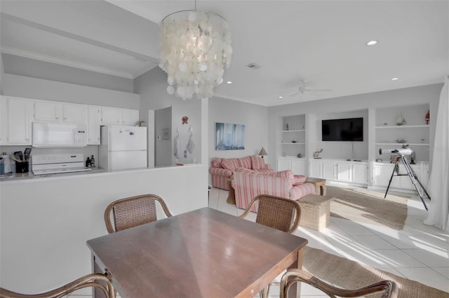 tiled dining space featuring built in features and ceiling fan with notable chandelier