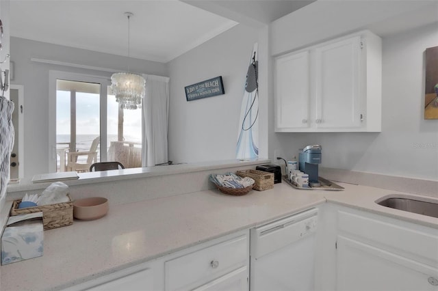 kitchen featuring a notable chandelier, dishwasher, light stone counters, white cabinets, and pendant lighting