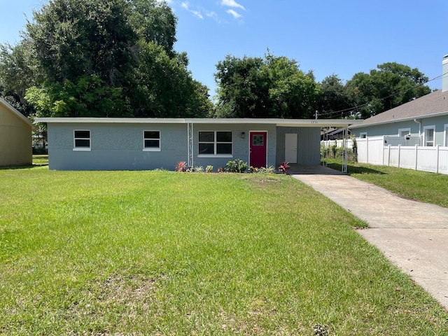 single story home with a carport and a front yard