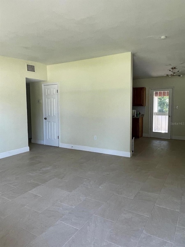 view of tiled empty room