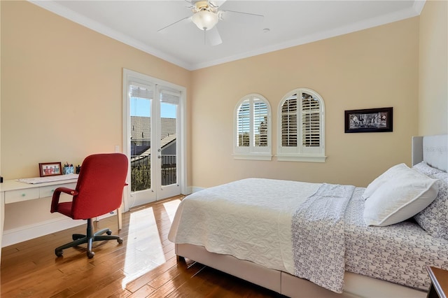 bedroom with wood-type flooring, ceiling fan, and ornamental molding